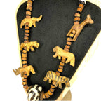 Hand Carved African Wild Safari Animal Wood Beaded Necklace Vintage Tiger Zebra African by TheVoyageBird